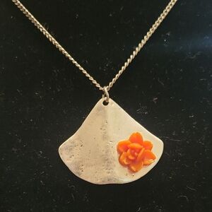 Elegant Silver Necklace with Orange Floral Accent